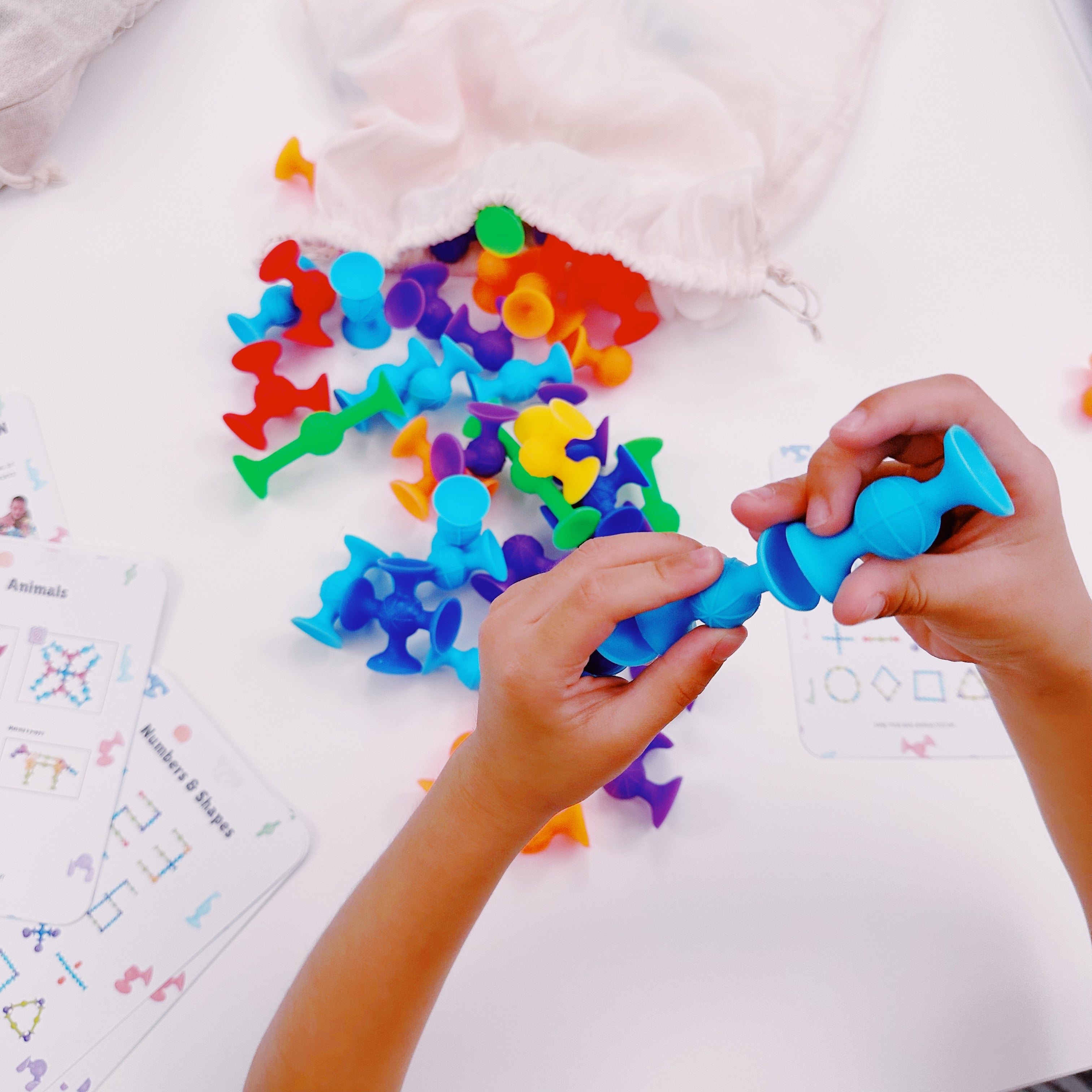 Popz by Wigglytots [15-piece Suction Play Set + Idea Book]